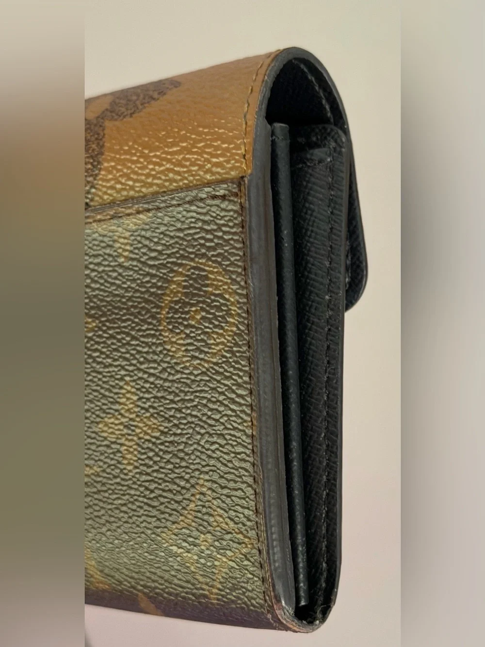 Louis Vuitton Sarah wallet in reverse monogram